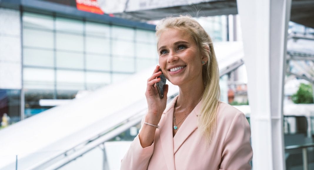 Beautiful business woman at the airport leaving on for a working