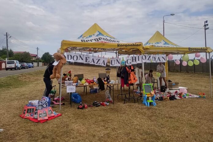 campania doneaza un ghiozdan
